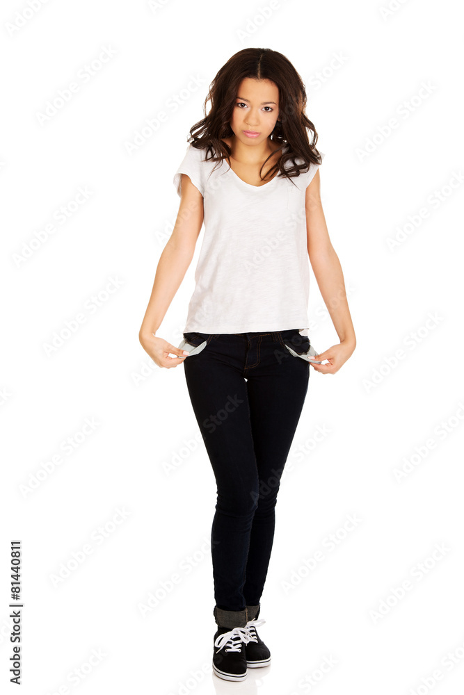 Woman showing empty pockets. Woman showing empty pockets.