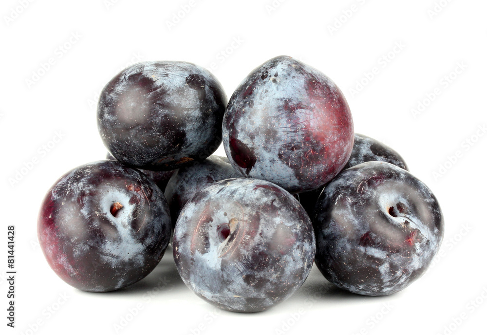 Obraz premium black plums, isolated on white background