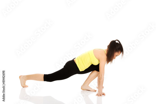 Fitness woman doing stretching exercise.