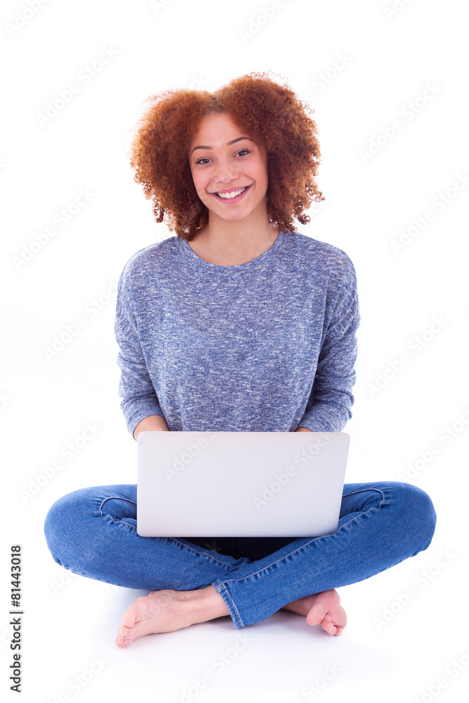 Naklejka premium Black African American student girl using a laptop