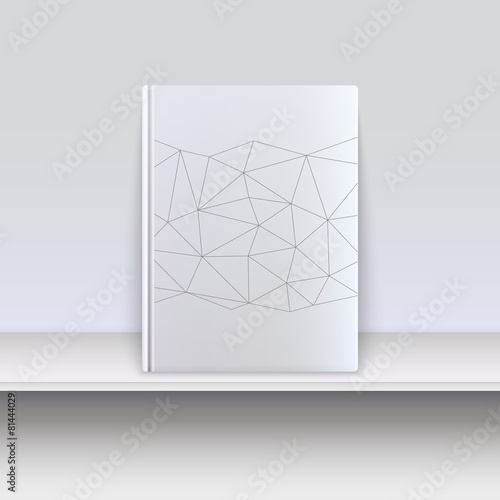 Cover book with techno pattern on a shelf.