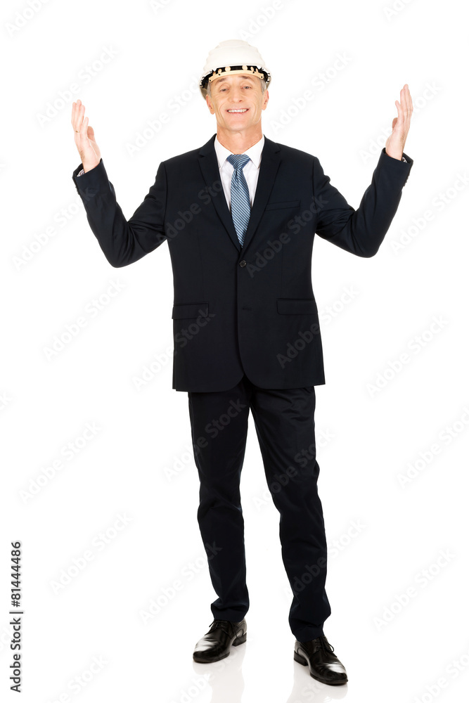 Smiling businessman with open arms up Smiling businessman with open arms up