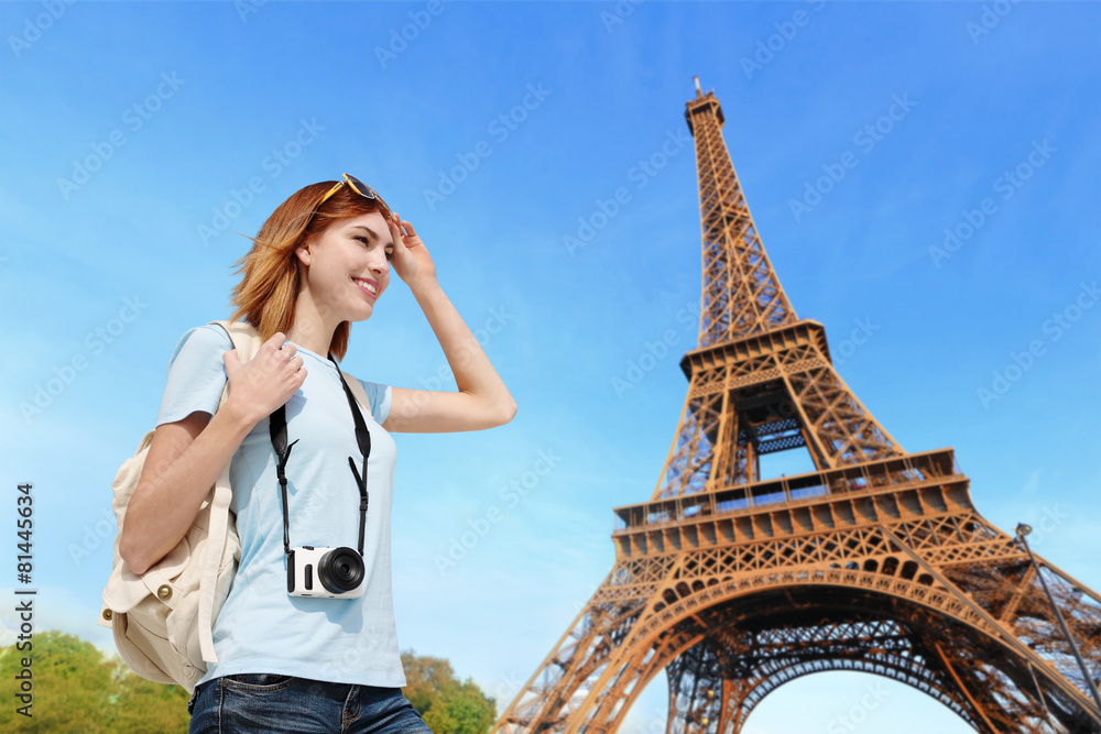 Happy travel woman in Paris