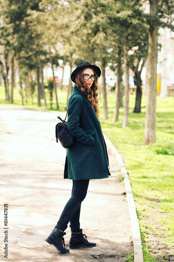 Outdoor fashion portrait of stylish pretty hipster girl Outdoor fashion portrait of stylish pretty hipster girl