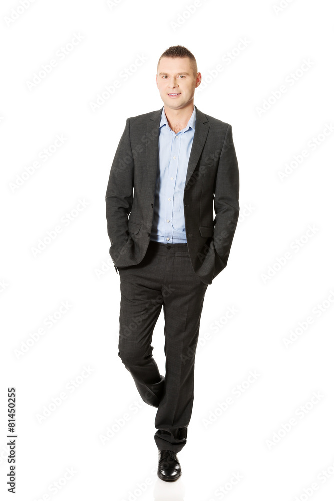 Businessman with hands in pocket Businessman with hands in pocket