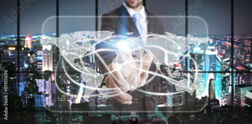 Businessman in his office using tactile interface