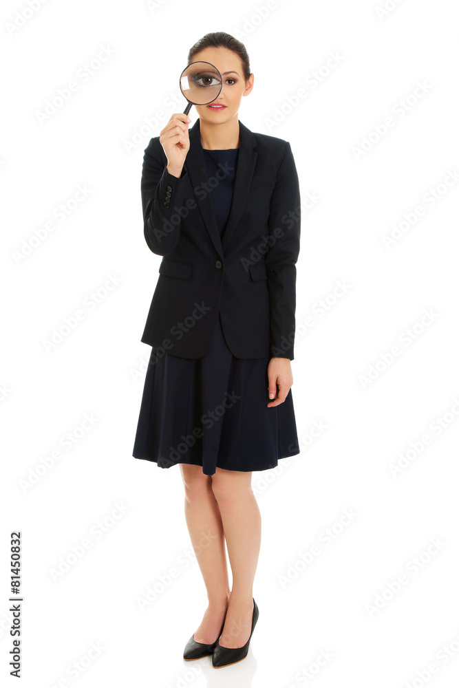 Businesswoman with magnifier glass. Businesswoman with magnifier glass.
