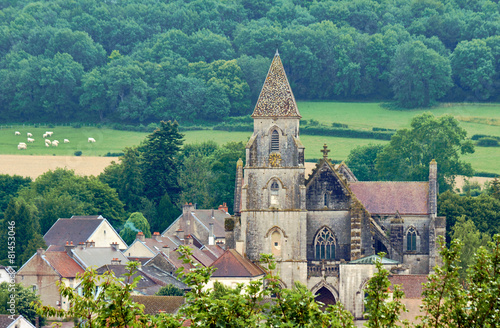 medieval church and roofs of houses in Champagne, France.