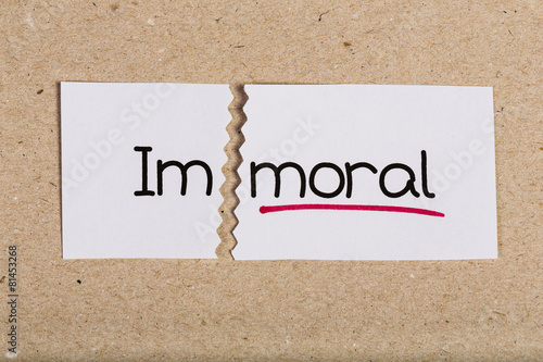Sign with word immoral turned into moral