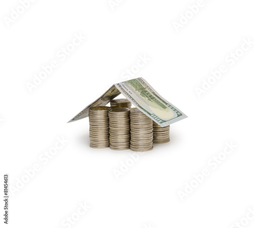 Coins house isolated on white