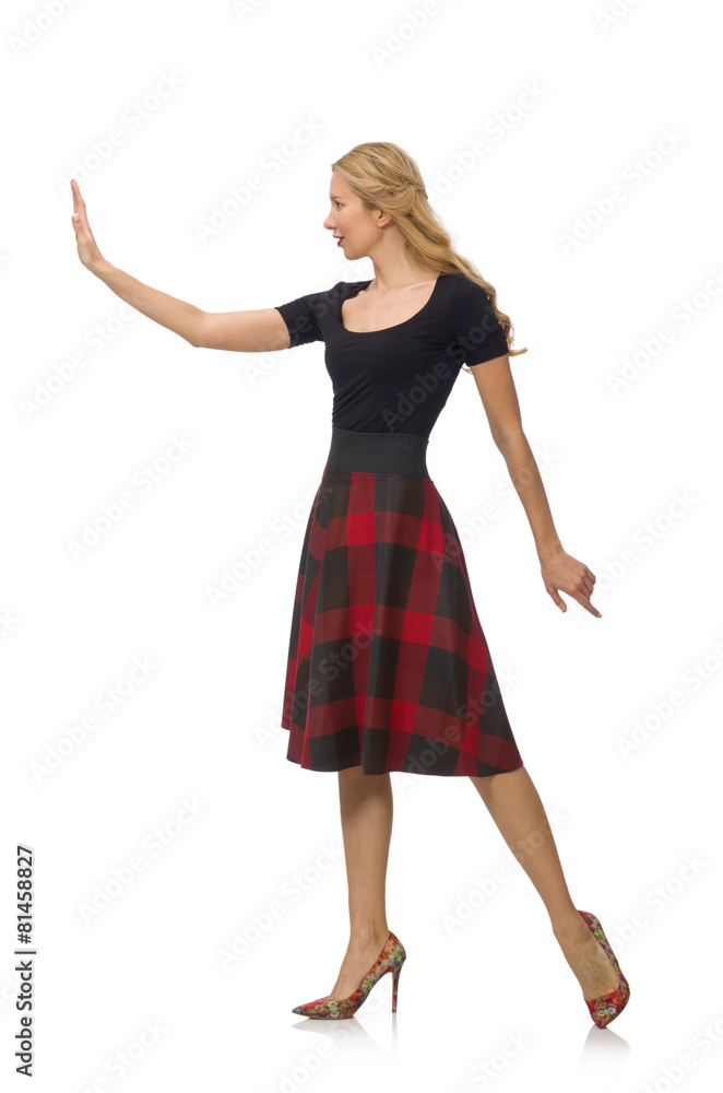 Naklejka premium Beautiful young woman in plaid dress isolated on white