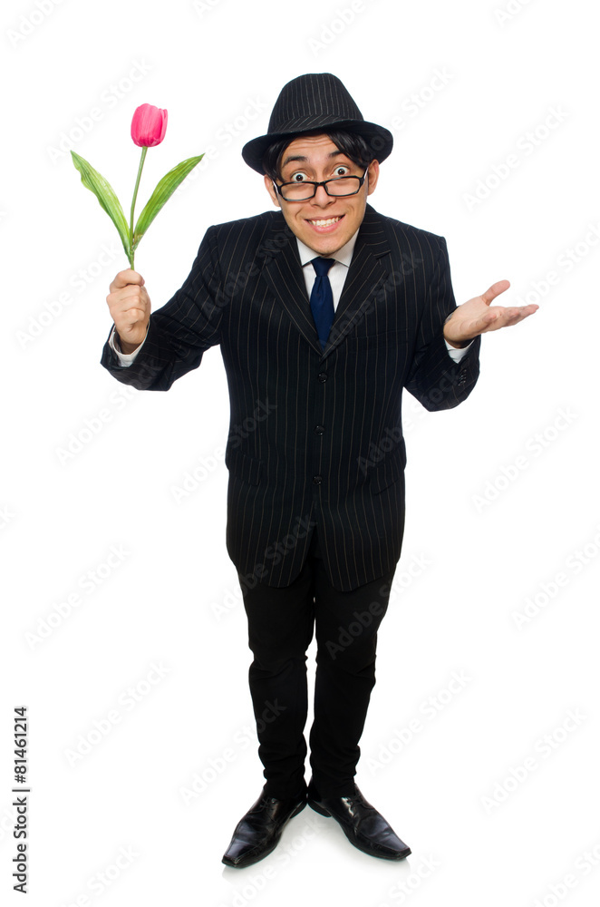 Young man in black costume with flower isolated on white Young man in black costume with flower isolated on white