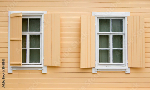 Windows and Shutters of Old Log House