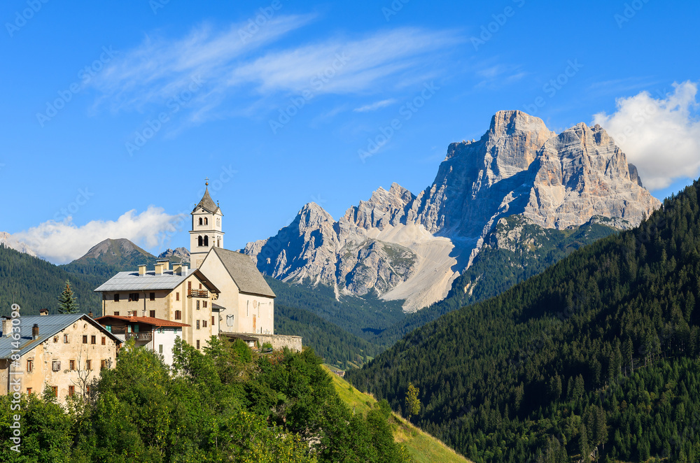 View of church in Pian village in Dolomites Mountains, Italy