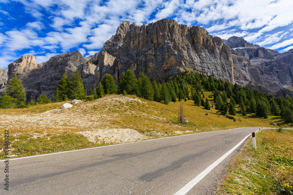 Fototapeta premium Scenic road near Passo Gardena in Dolomites Mountains, Italy
