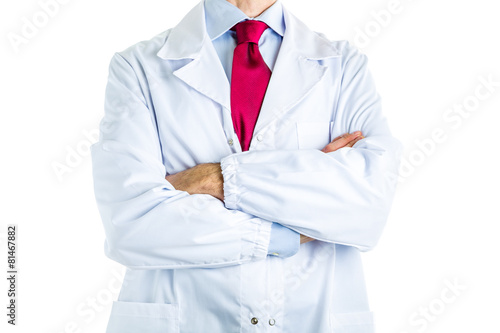 Doctor in white coat crossing arms
