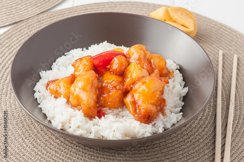 Sweet and sour chicken with rice photo