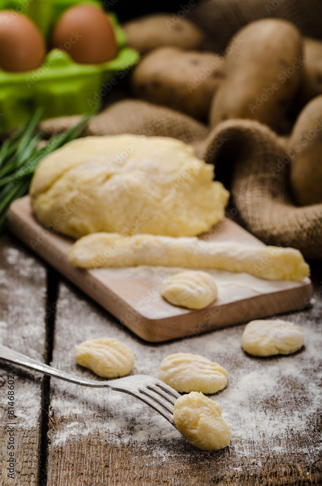 Preparing gnocchi Preparing gnocchi