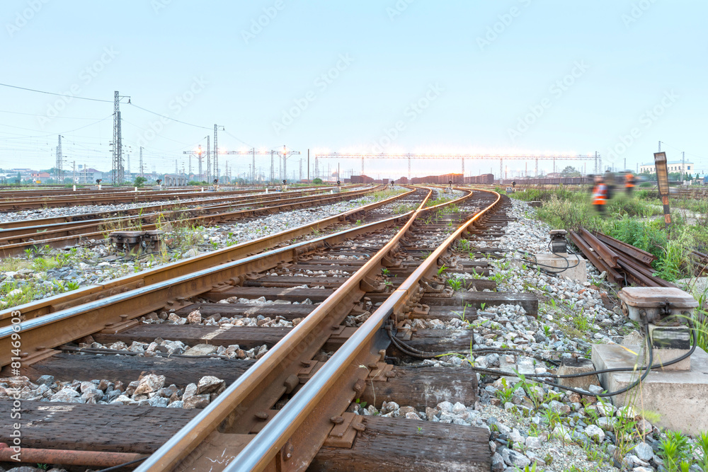 Cargo train platform at sunset with container