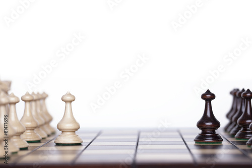 Chess pieces on a chessboard.