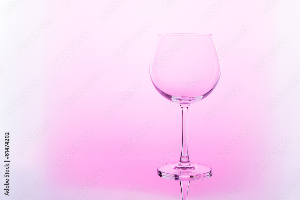 Empty wine glass. isolated on pink background Empty wine glass. isolated on pink background