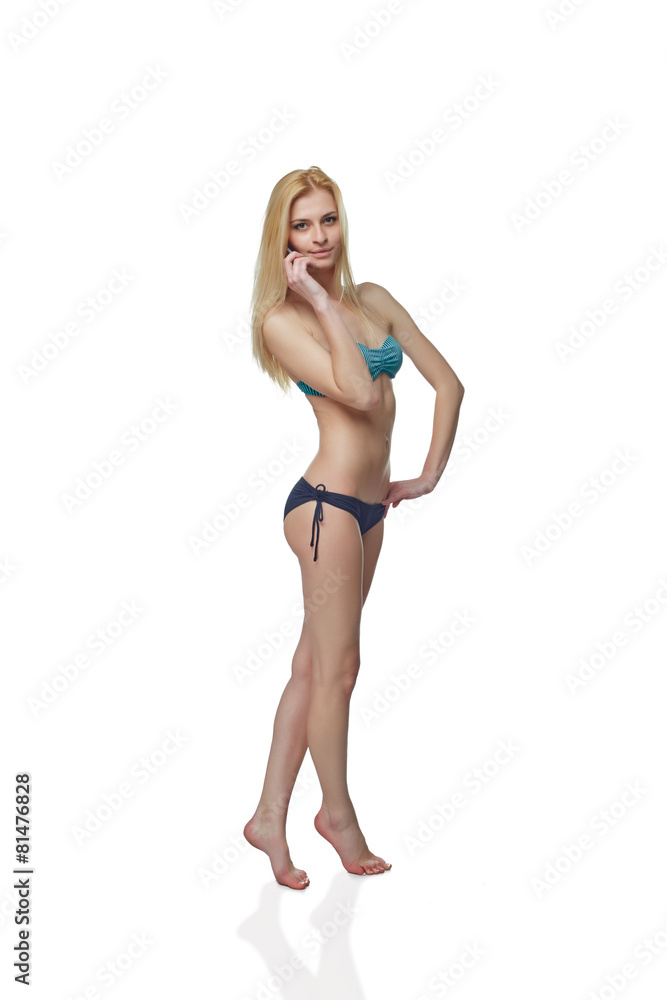 Young Girl In Swimming Suit Speaking at Phone Young Girl In Swimming Suit Speaking at Phone