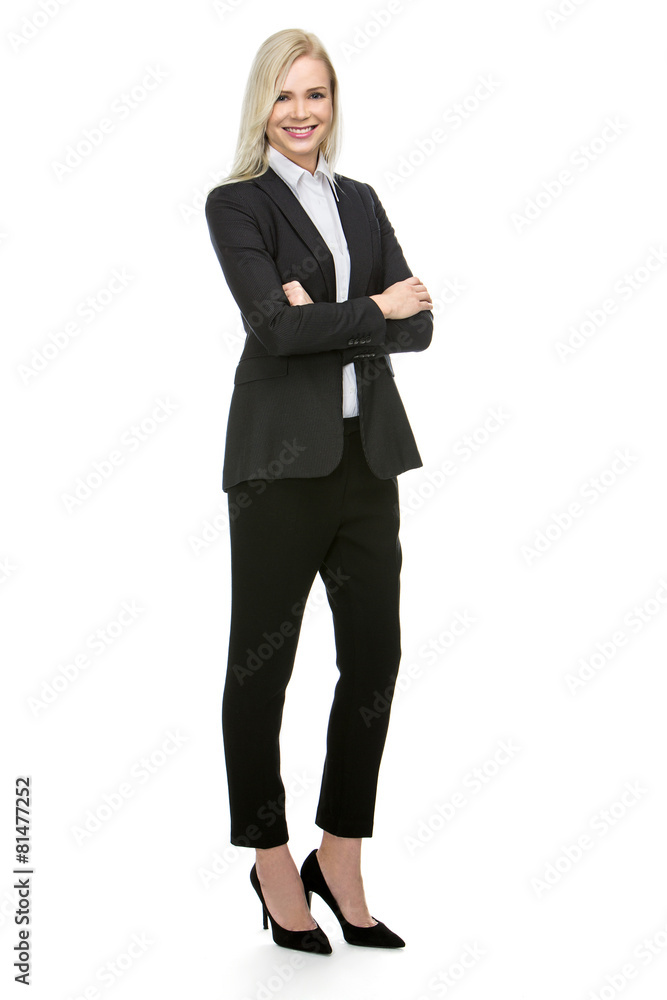 blonde businesswoman with her arms folded smiling at the camera blonde businesswoman with her arms folded smiling at the camera