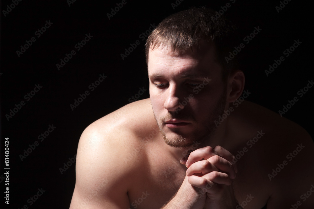 Image of shirtless man keeping his hands by face Image of shirtless man keeping his hands by face
