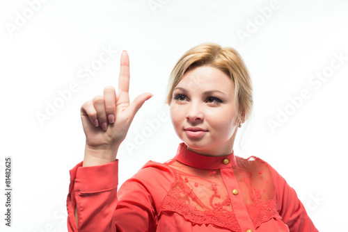 Happy business woman pointing an idea - isolated white