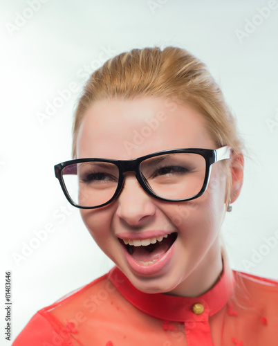 Business woman in glasses shouts on white background
