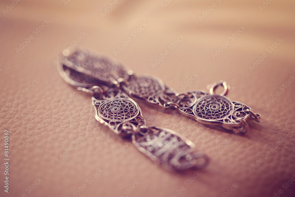 Bracelet on wooden table Bracelet on wooden table