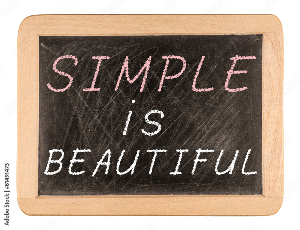Fototapeta premium Simple is beautiful words written on blackboard