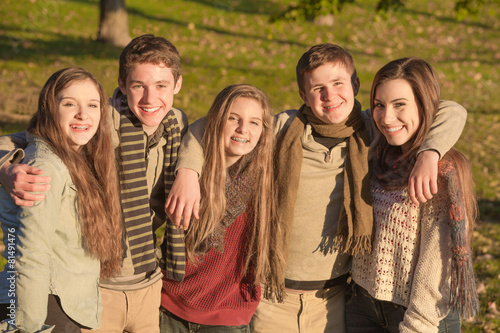 Group of Five Teens Embracing