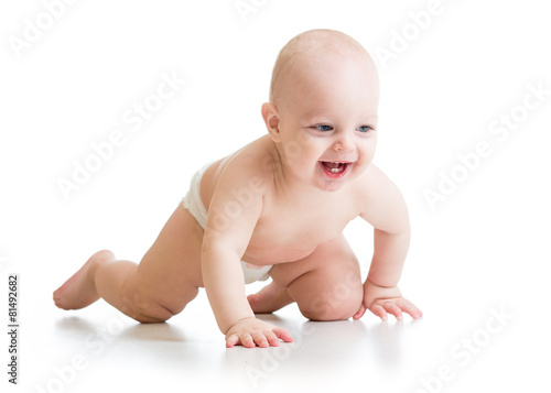 smiling crawling baby isolated on white background