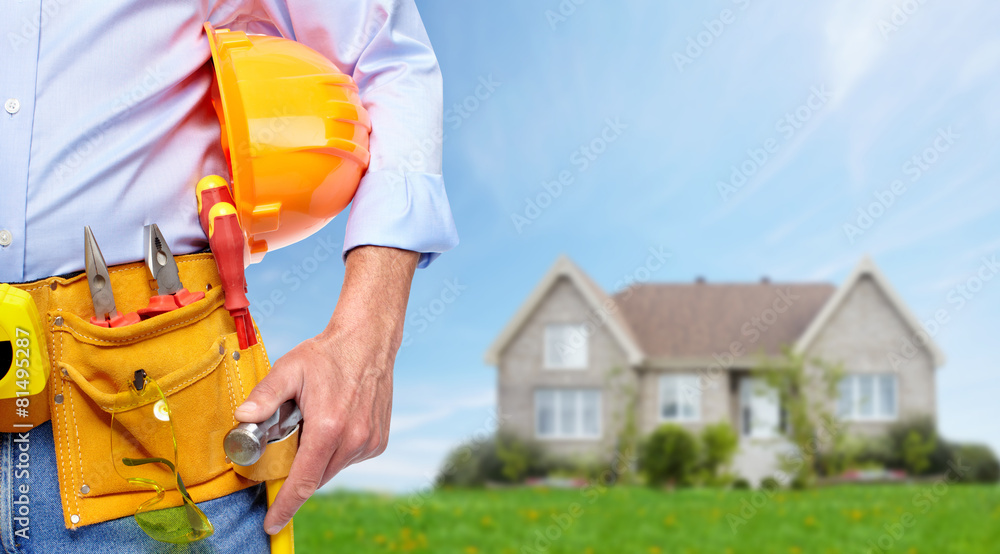 Builder handyman with construction tools. Builder handyman with construction tools.