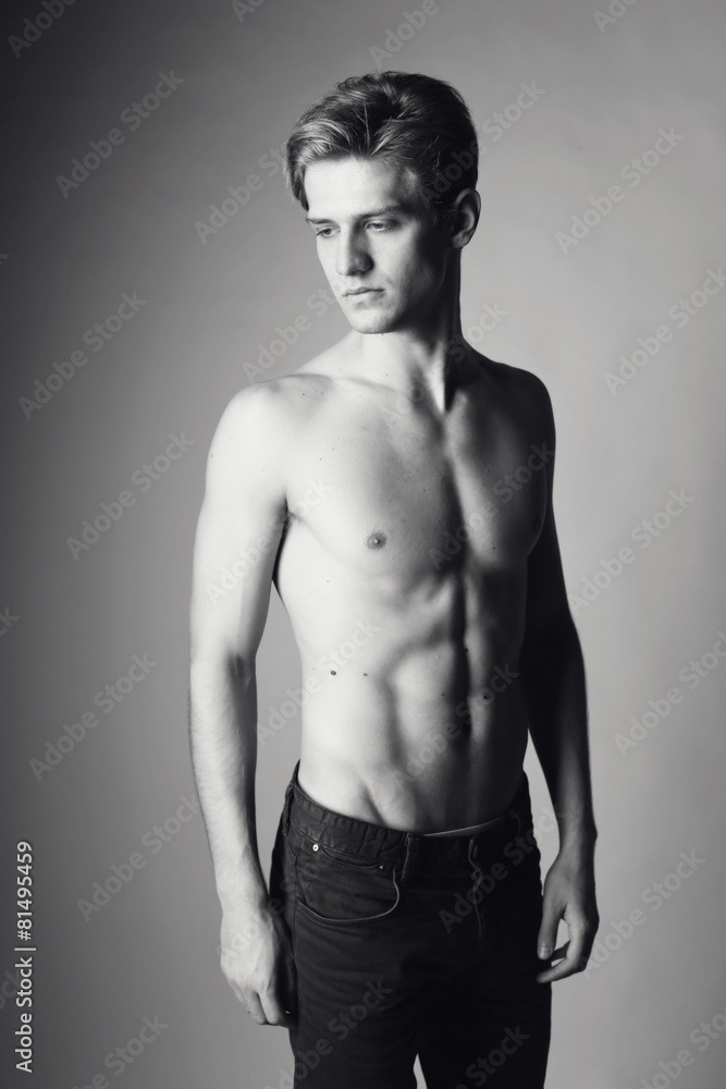 Handsome man posing in the studio Handsome man posing in the studio