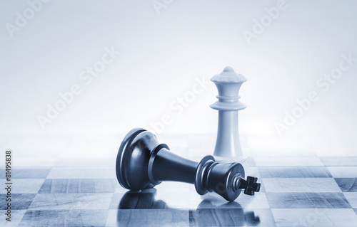 Fallen chess king as a metaphor for fall from power photo