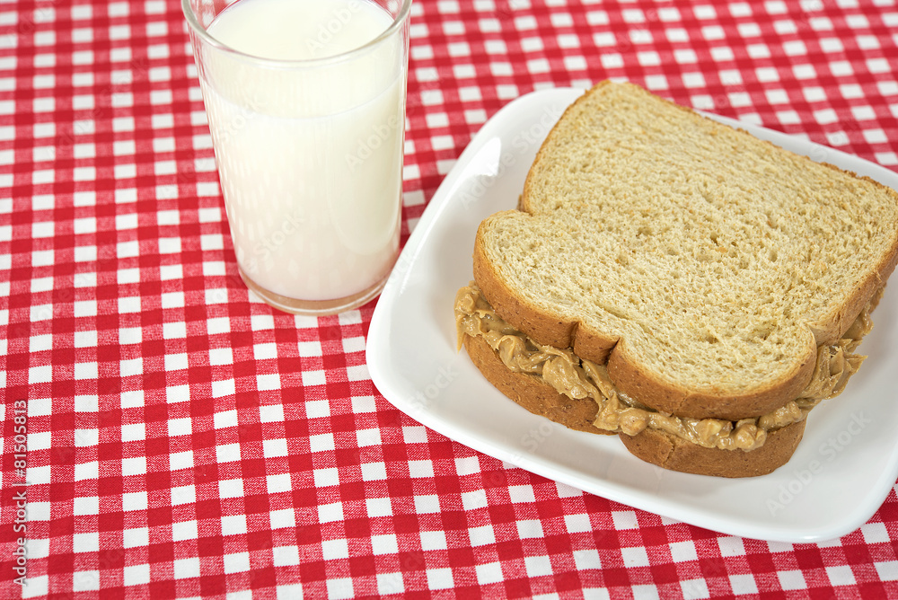 peanut butter sandwich with glass of white milk peanut butter sandwich with glass of white milk