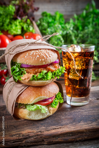 Takeaway fresh burger with cold drink