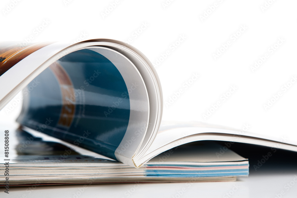 Fototapeta premium stack of magazines on a white background
