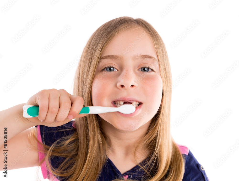 Blond kid indented girl cleaning teeth toothbrush Blond kid indented girl cleaning teeth toothbrush
