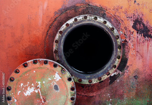 opened rusty manhole