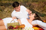 Couple having a picnic in park