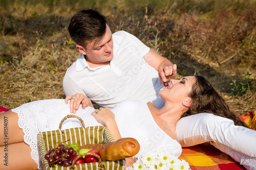 Couple having a picnic in park