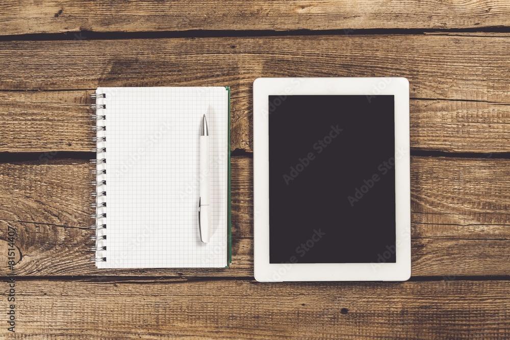 Ipad. Digital tablet with phablet and notepad on desktop Ipad. Digital tablet with phablet and notepad on desktop