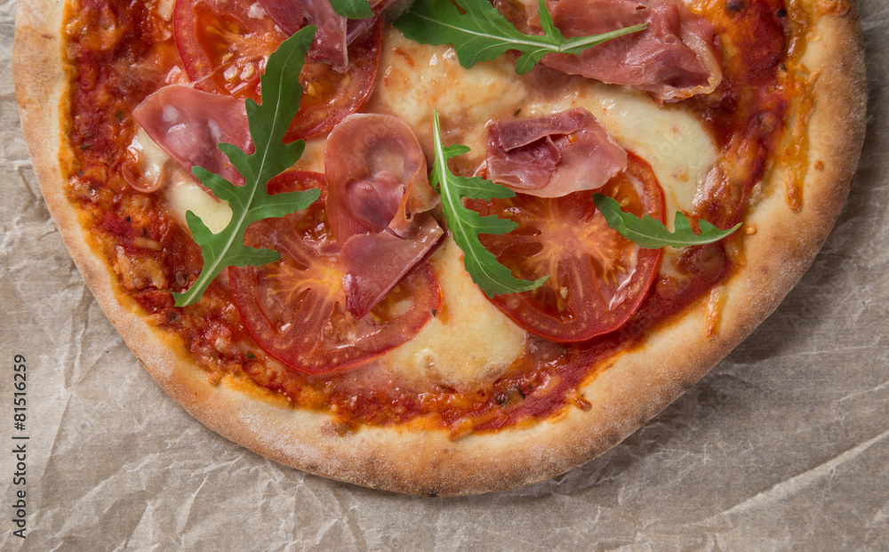 Delicious italian pizza served on wooden table