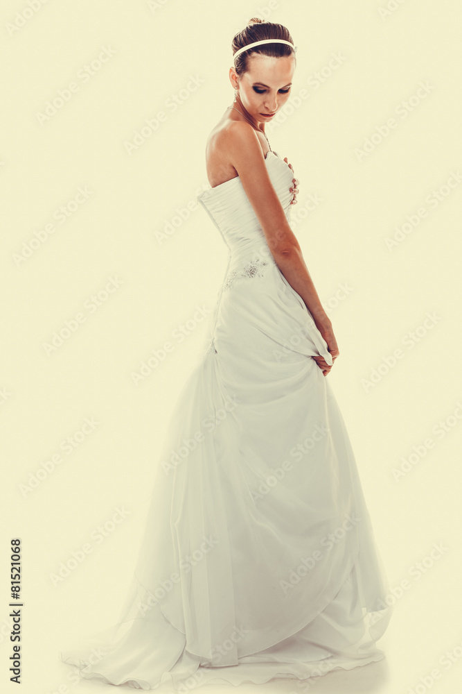 Full length bride in white wedding gown Full length bride in white wedding gown