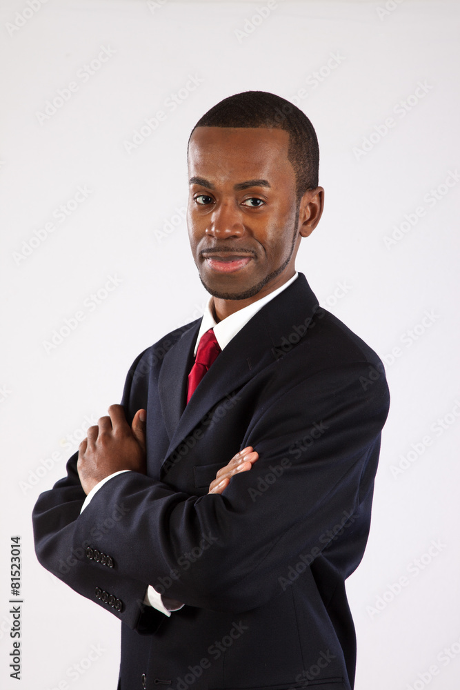 Black businessman with arms folded Black businessman with arms folded