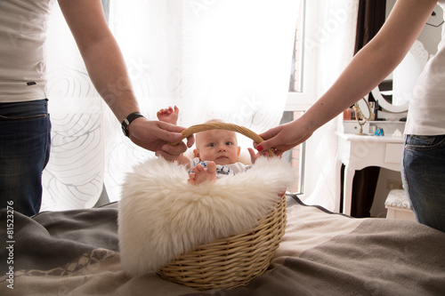 newborn baby in the basket.