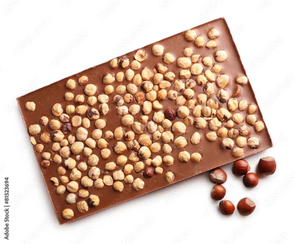 Milk chocolate bar with hazelnuts isolated on white Milk chocolate bar with hazelnuts isolated on white